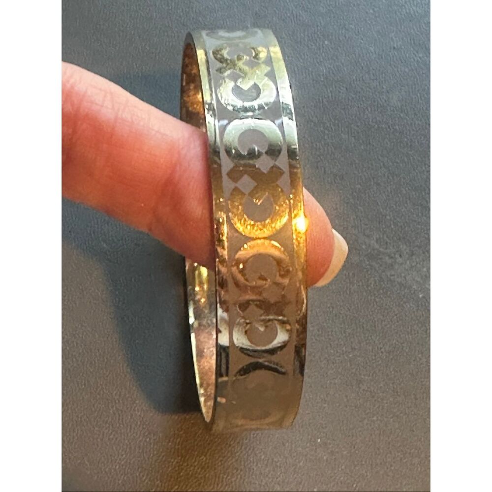 Cole Haan Logo gold tone bangle bracelet grey